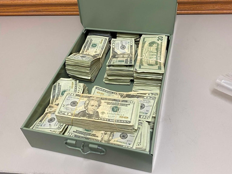 a safe box full of cash that was recovered
