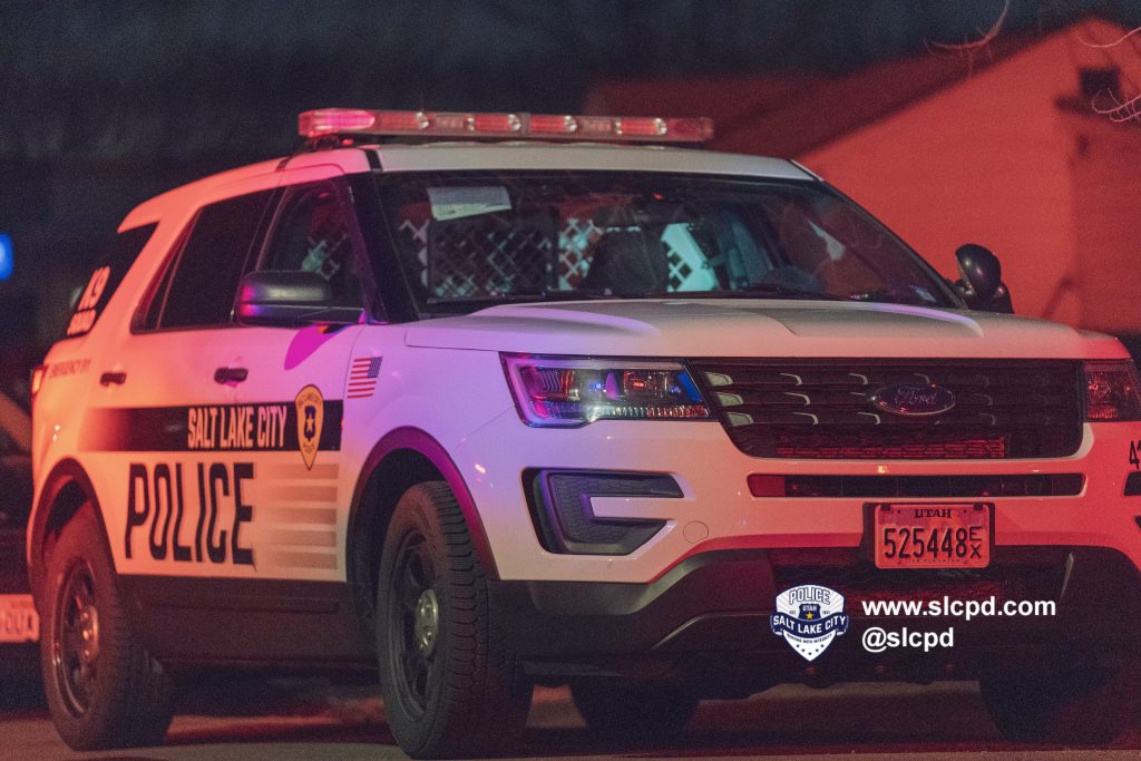 A photo of a SLCPD police SUV at the scene of a shooting on Ivy Circle in Salt Lake City.