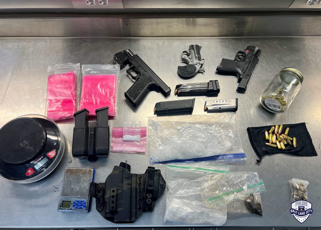 A photo of guns and illegal drugs seized recently by the SLCPD Violent Criminal Apprehension Team.