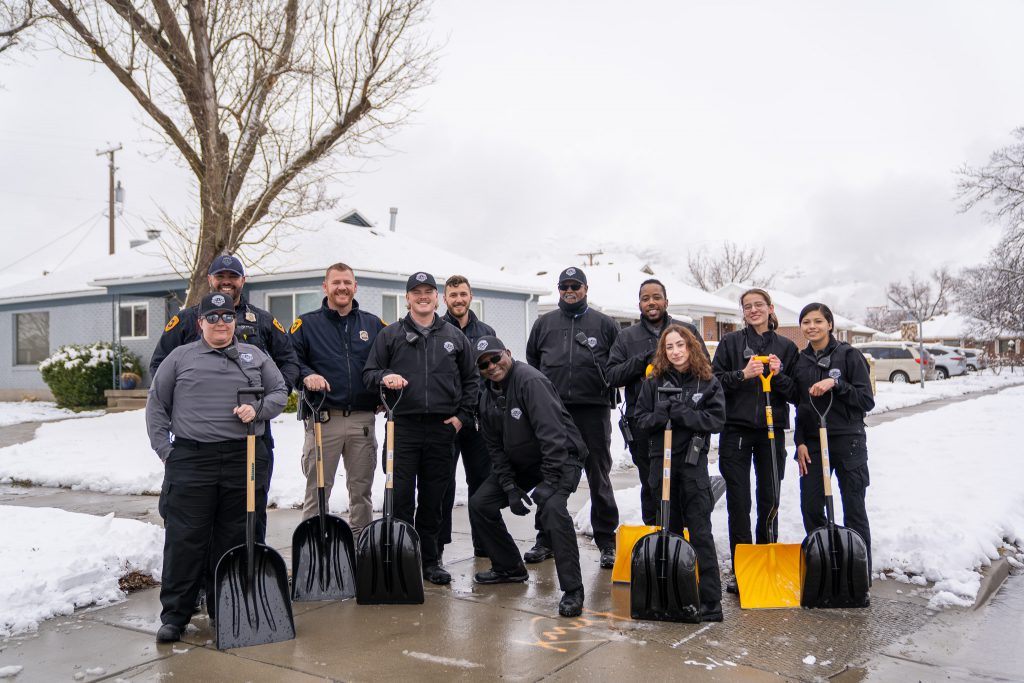 Officers and members of the Salt Lake City Police Department's Community Response Team pose for a group photo.